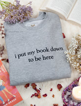 I put my book down to be here